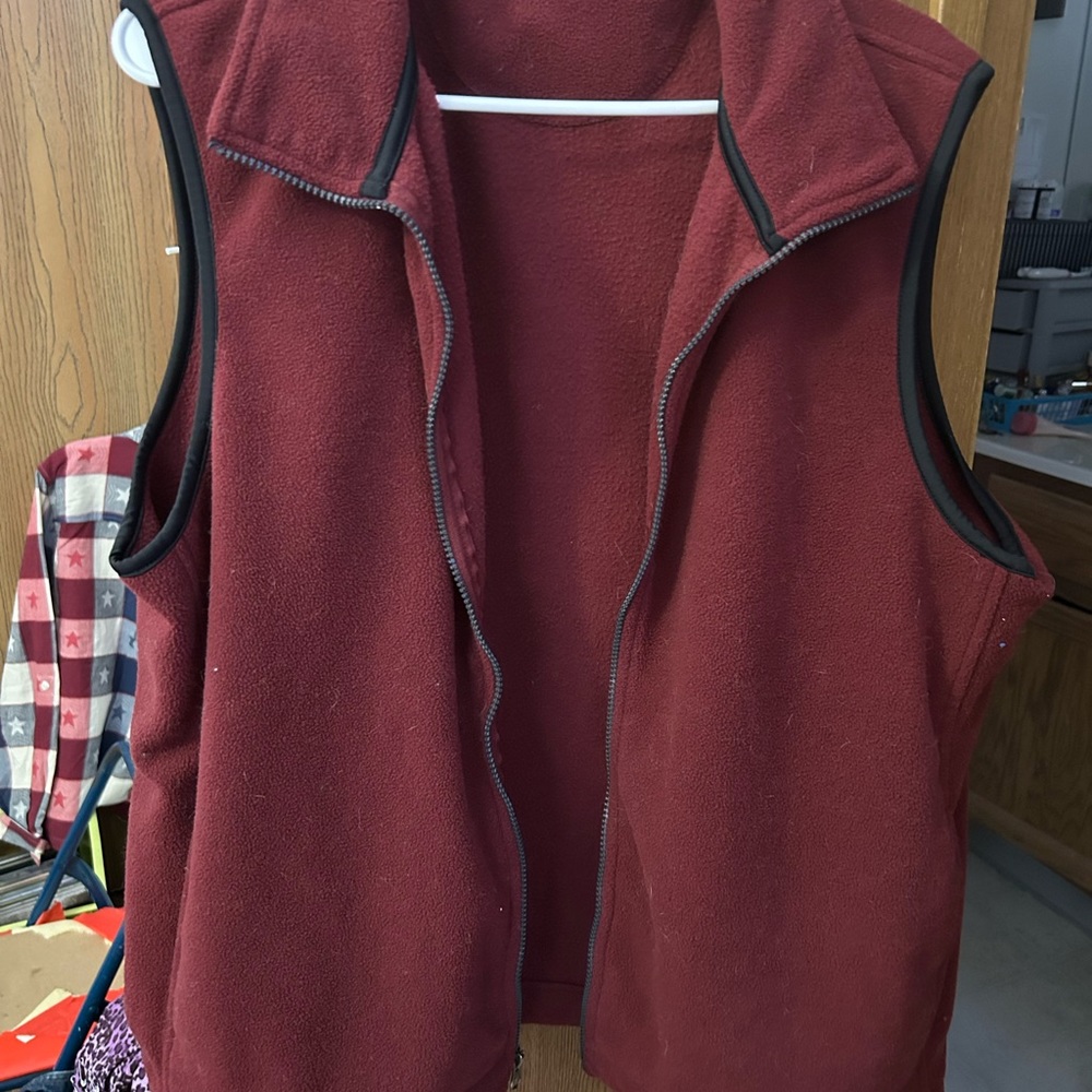 Women’s vintage vest. Maroon/rust color. Never worn.